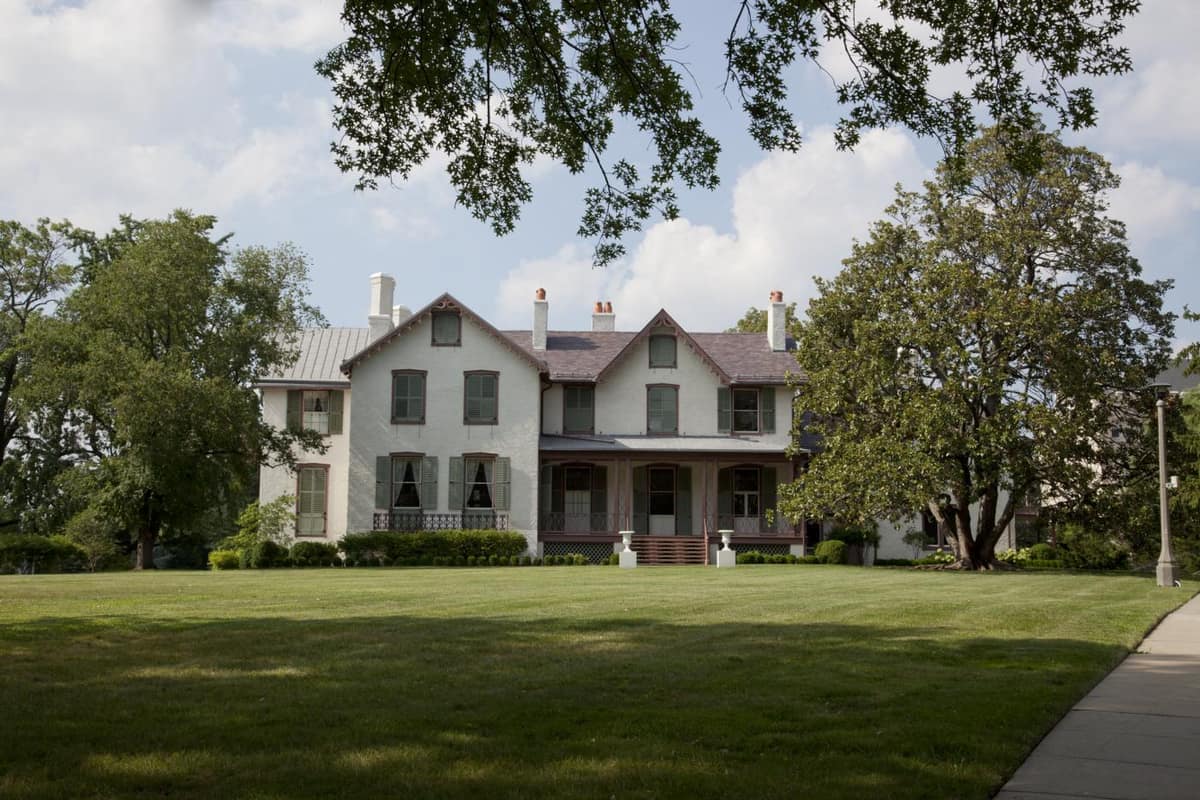 President Lincoln's Cottage seen across its broad front lawn on a summer day