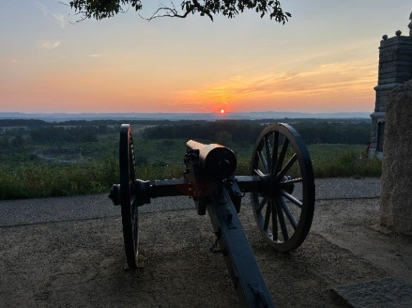 Leaders examine the battlefield at Little Round Top